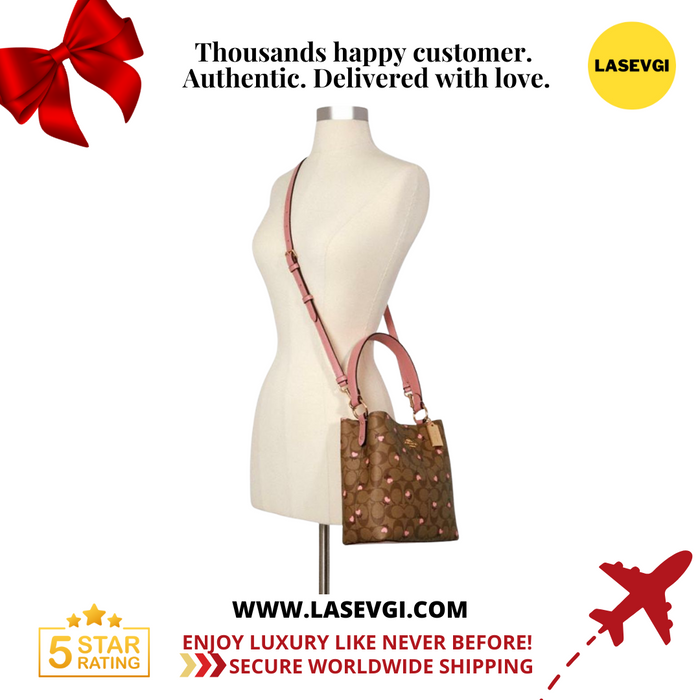 COACH Small Town bucket bag in signature canvas with heart floral print