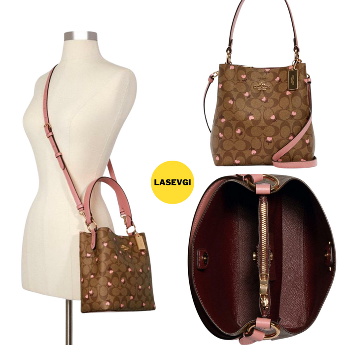COACH Small Town bucket bag in signature canvas with heart floral print