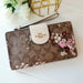 COACH Tech Phone Wallet in Signature Canvas with Evergreen Floral Print - www.lasevgi.com