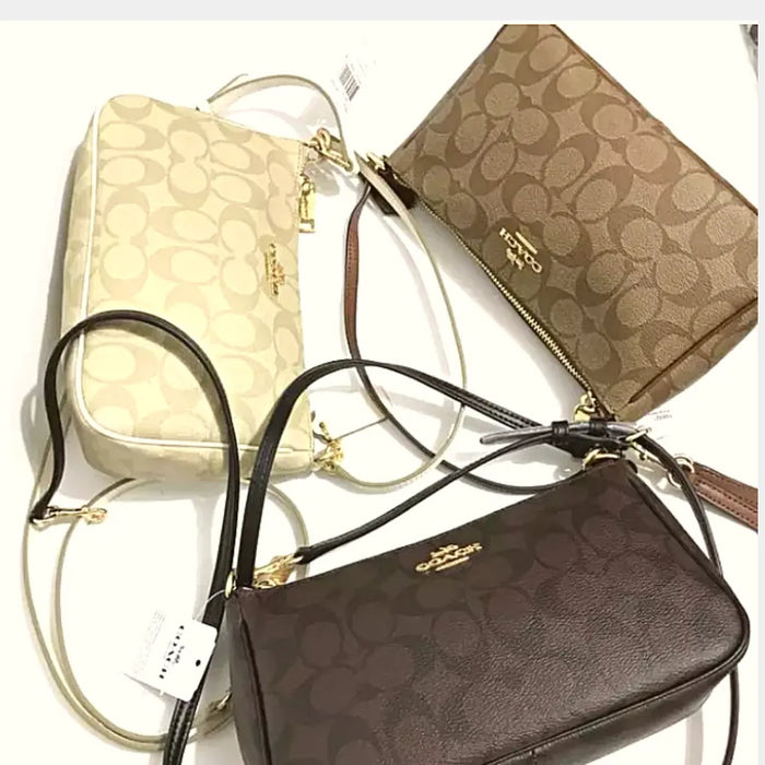 COACH Messico Top Handle Pouch Brown www.lasevgi