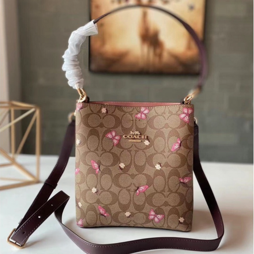Coach butterfly bucket bag hotsell